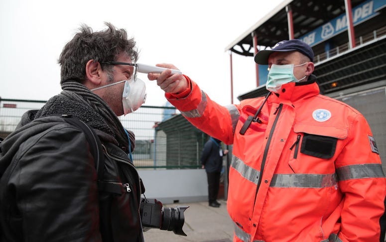 Italian health officials take temperatures
